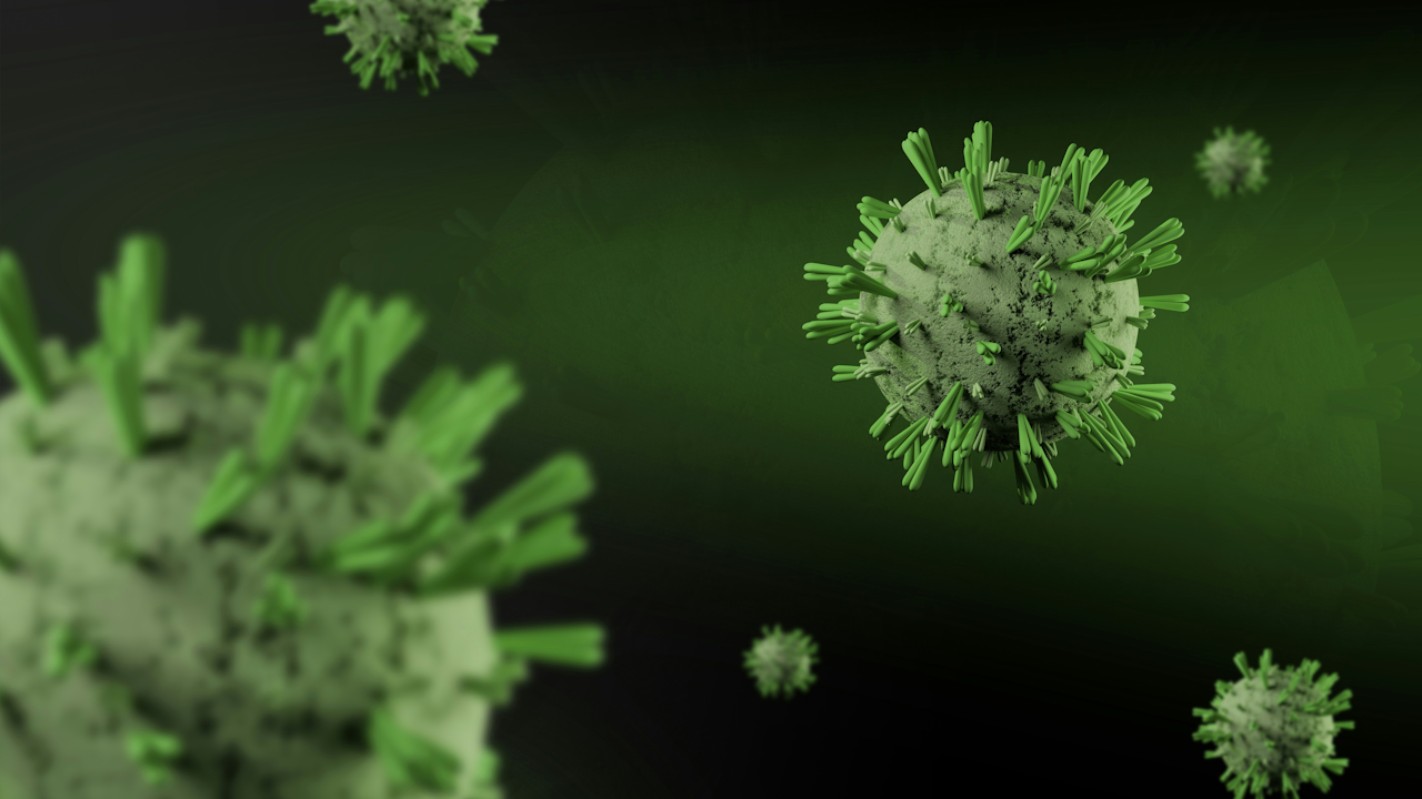 3D rendering of green virus particles with spiky surfaces floating against a dark green background.